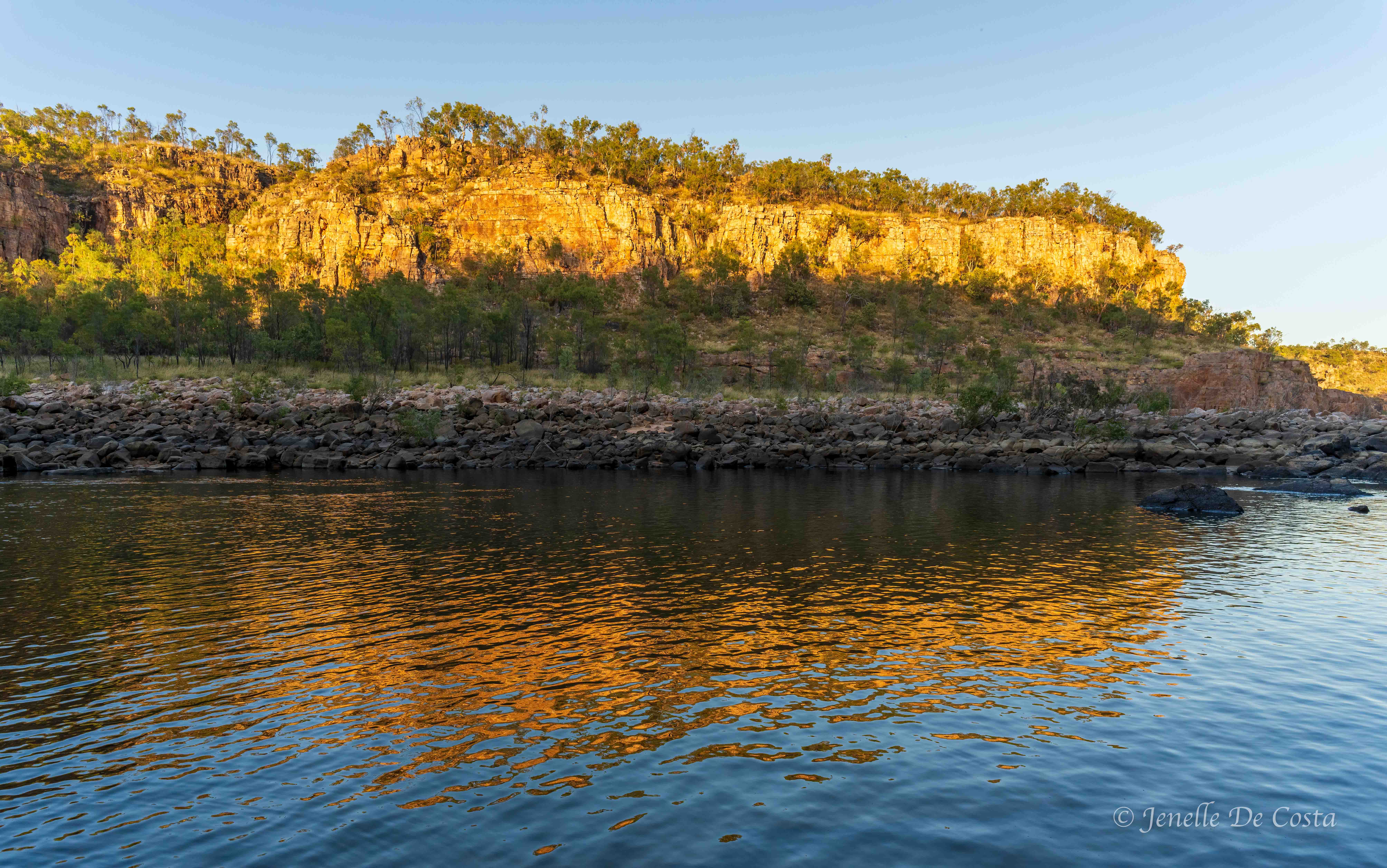 Sunrise turns the gorge walls golden, Nitmiluk Gorge (Katherin Gorge)